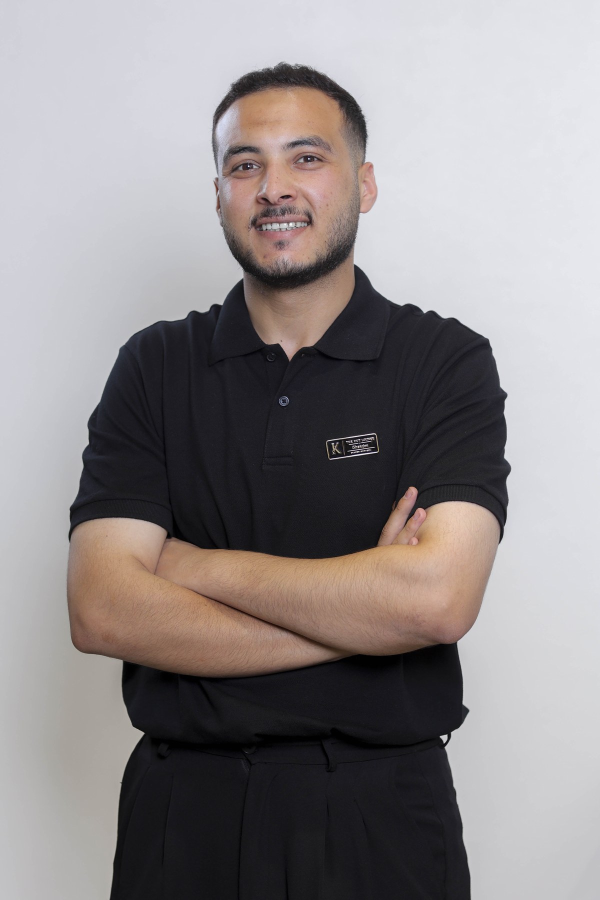 A Kut Lounge barber in the salon uniform